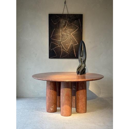 A Beautiful 1970s Red Travertine Table by Mario Bellini. This handsome table stands well on it's 5 columns with lovely...