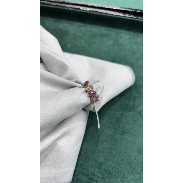 GEMSTONE DETAILS GEMSTONE DETAILS Gold Purity: 18K Solid Gold MULTI SAPPHIRE: 2.89 CTS DIAMOND: 0.31 CTS 18K GOLD NET...
