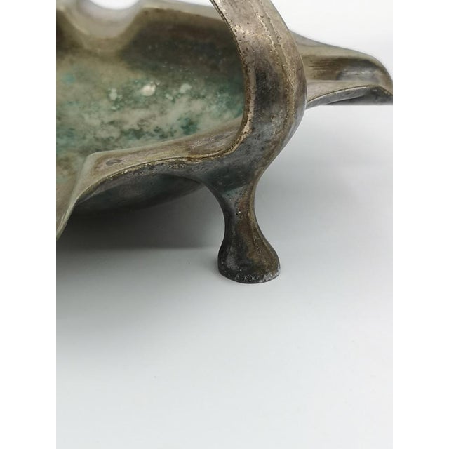 Rare set of two original Wellner ashtrays with integrated match holders, made of metal, presumably hotel silver, with an...