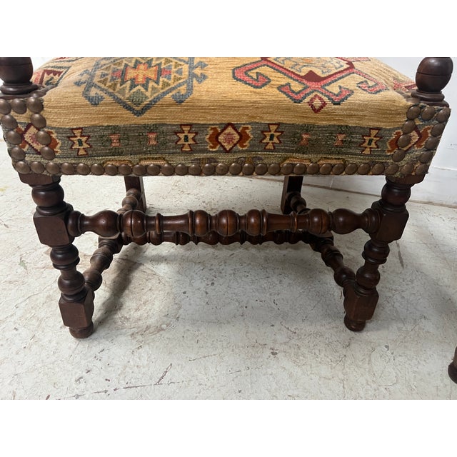 Set of four louis xiii style armchairs in solid walnut four legs with carved stretchers upholstery and floral pattern in...