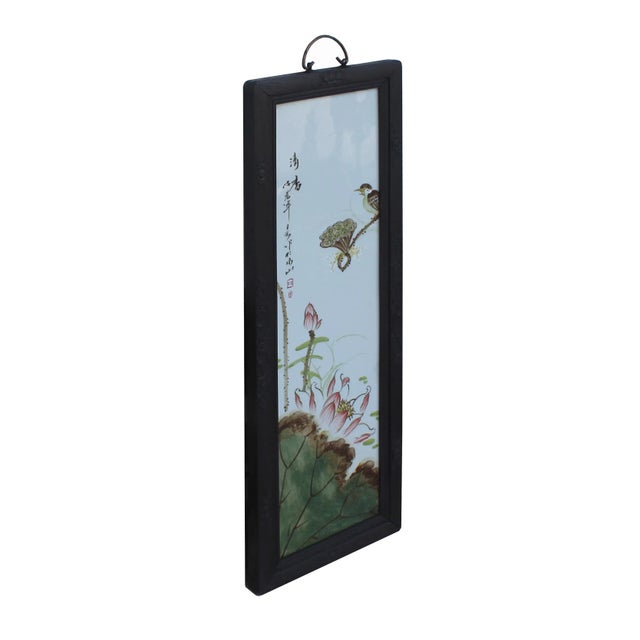 This is a vintage traditional Chinese oriental wall decoration piece made of wood frame and porcelain center plaque with a...