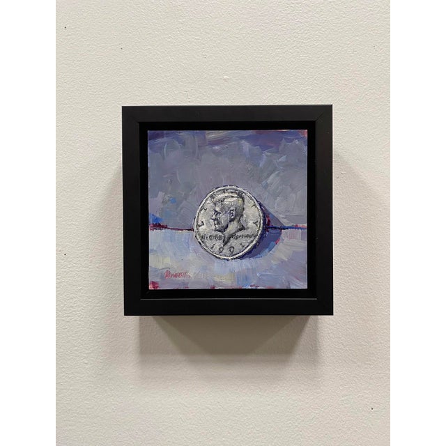 This oil painting captures a detailed depiction of a 50 Cent coin featuring John F. Kennedy, set against a softly...