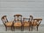 A classic set of four Pottery Barn Napoleon rush seat dining chairs. This set has two arm chairs and two side chairs. The...