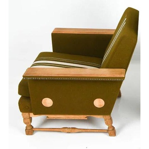 A hip and stylish retro modern, circa 1960's/70's Danish mid-century lounge chair. The chair is constructed on a solid...
