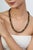 The 295 Ct Natural Labradorite Rondelle Beaded Necklace adds a distinctive touch to your jewelry collection, featuring 295...
