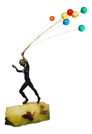 Sculpture of Boy Holding Balloons by Curtis Jere