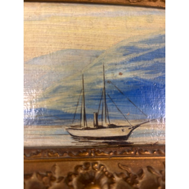 This vintage English oil on board seascape painting offers a quiet, contemplative view of the sea, captured with a...