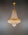 Antique Oval Brass Ceiling Crystal Chandelier from Italy, 1918 This stunning antique chandelier hails from Italy, crafted...