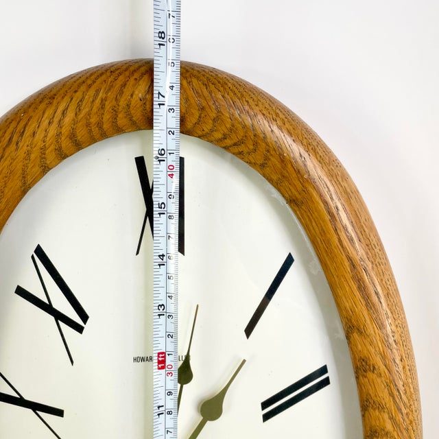 Vintage Howard Miller Model 622836 Oval Golden Oak Wall Clock Modern