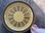 Fun and groovy 1970s stoneware platter, round in shape. It is presented on a golden mustard glaze with teeny speckles...