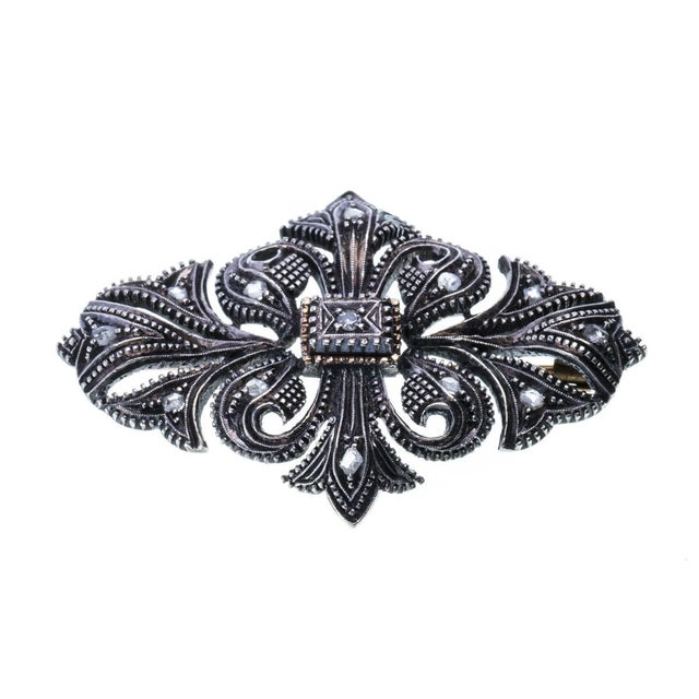 In silver and gold, 800 thousandths and silver 833 thousandths, with 'Tiger and Boar II' hallmark dated 1887-1937. Set...