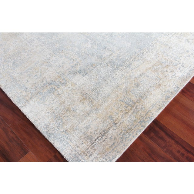 Unique splashes of color guide the eye through the Newport rug's spontaneous design. Handmade from the richest New Zealand...