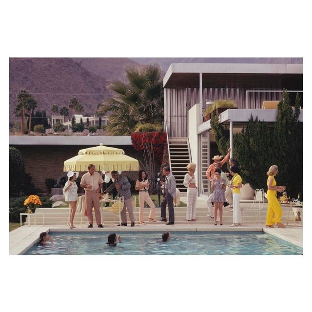 Poolside Host 1970 Guests by the pool at Nelda Linsk’s desert house in Palm Springs, California, January 1970. The house...