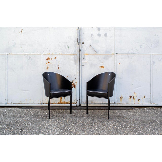 Chairs with lacquered wood backrest, padded seat covered in leather and metal legs. Model Pratfall Designer Philippe...