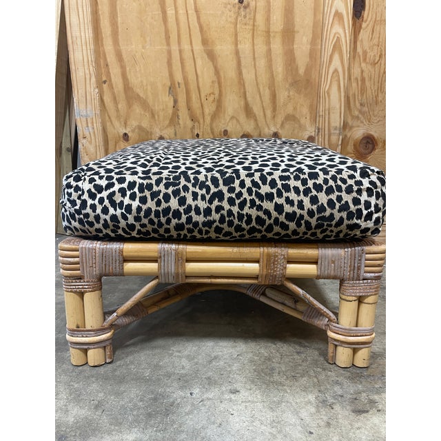 The perfect vintage bamboo ottoman upholstered in a stylish leopard suede fabric