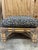 The perfect vintage bamboo ottoman upholstered in a stylish leopard suede fabric