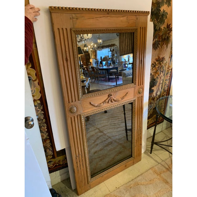 Beautiful antique carved natural oak trumeau mirror having lovely round medallions and swag decoration with top and bottom...