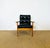 Elegant vintage armchair with a Scandinavian design typical of the 1960s. The frame is made of solid light beech, known...