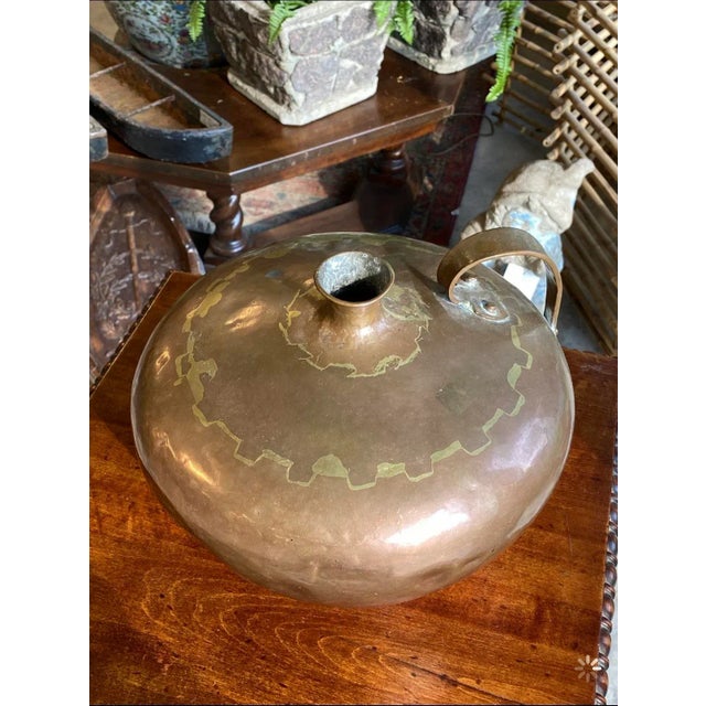 Antique hand forged copper water jug or vessel. Made in the Early 20th Century.