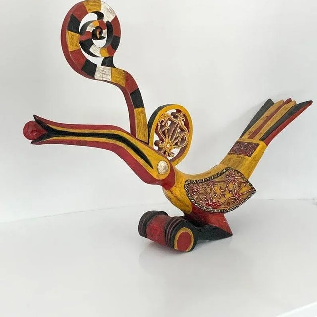 Vintage from the 1970s It's a rhinoceros hornbill and it is a real bird found in Borneo and Southeast Asia! The "horn" or...