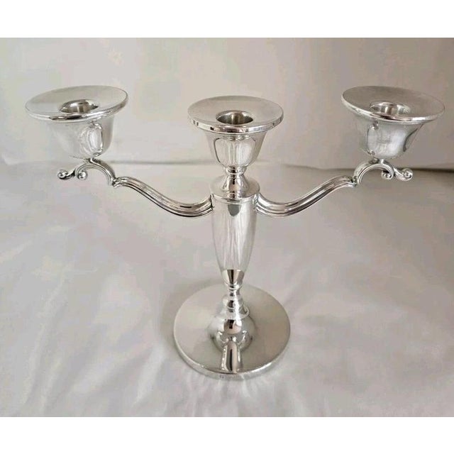 A handsome vintage English sterling silver three-light candelabra, hallmarked Birmingham 1988 and made by Barker Ellis...