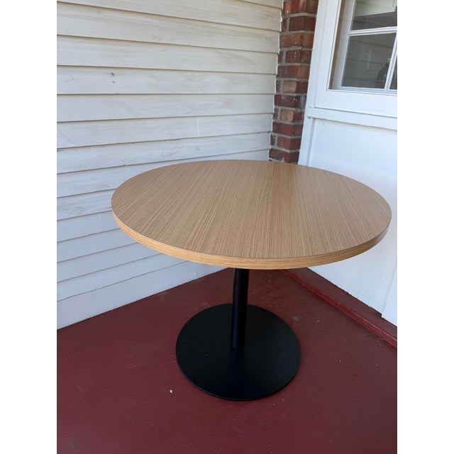 This is a "Disc" table by West Coast Industries, a commercial contract furniture manufacturer based in California (Made in...