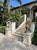 Pair of Vintage Cast Stone Winged Griffins For Sale - Image 9 of 12