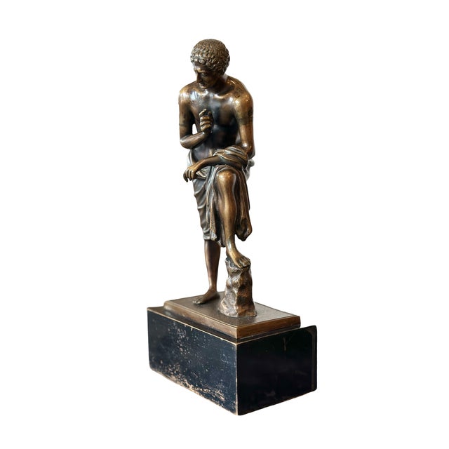 A finely cast 19th century Grand Tour bronze depicting The Spinario (also known as The Thorn Puller), a classical Greco-...