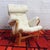 A pair of Pernilla lounge chairs designed by Bruno Mathsson for DUX, with sculpted bentwood frames and brand new ivory...