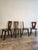 An exceptional and highly collectible set of four "King" dining chairs designed by Finnish architect and designer Olavi...