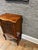 This is a beautiful antique English cabinet with gorgeous floral carvings on the door. It has inset hinges and an...