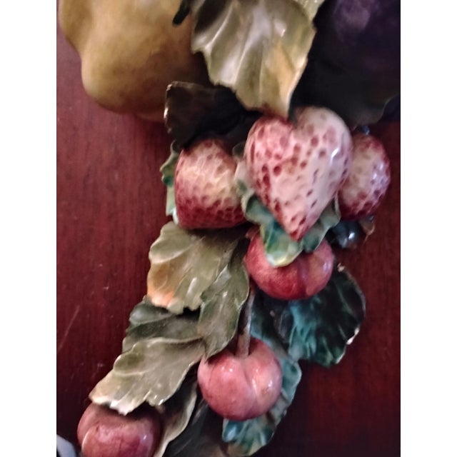 Hand painted and used as a table centerpiece or wall art. Included picture of Italy stamp on back of piece which authentic...