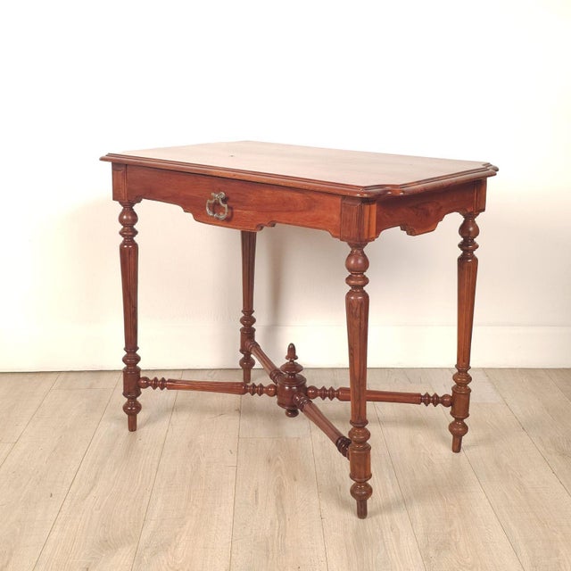 A French walnut Belle Époque one-drawer small table, circa 1900. 23.5" knee.