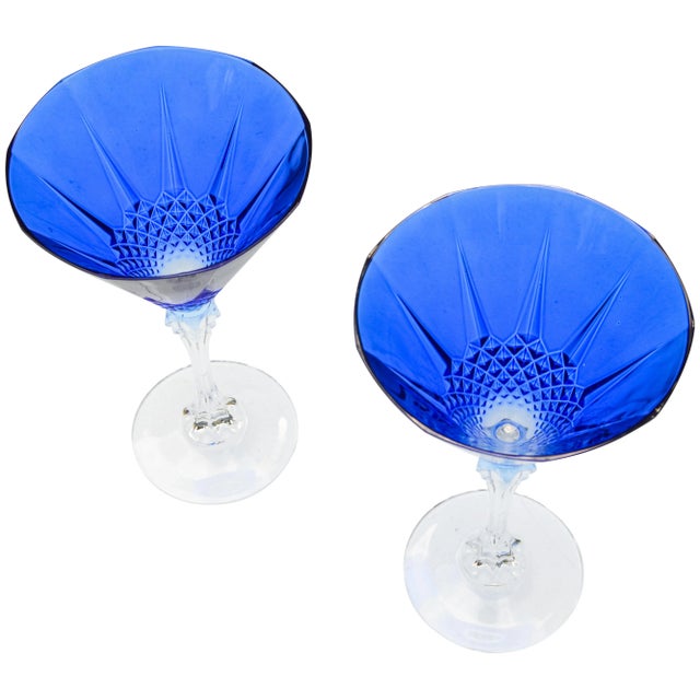 Set of two vintage blue crystal champagne flutes with clear stems and ornate diamond details. No maker's markSet of two...