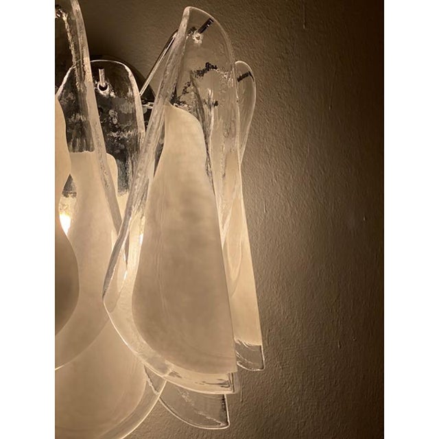 Contemporary and white and transparent “rondini” in trasparent and white murano glass transparent- white “rondini”...