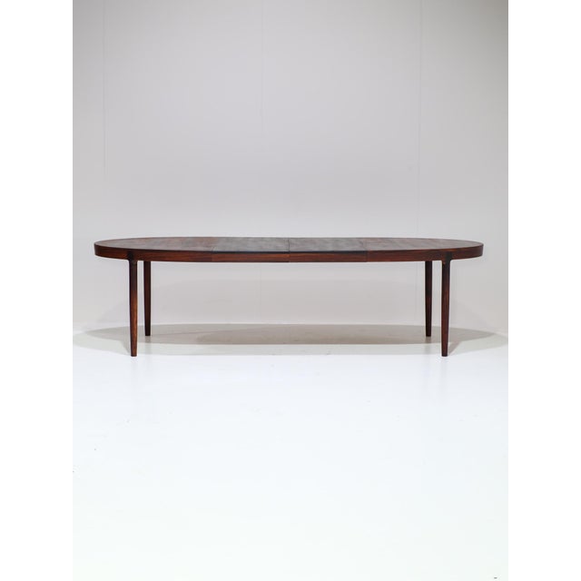 Rare dining table from Denmark, designed by Harry Østergaard for A/S Randers Møbelfabrik in the 1960s. This table has a...
