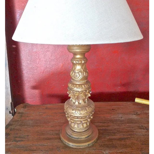 French 19th Century Hand Carved Hand Painted Gold Leaf Wood Candlestick Lamp. It has been converted and US wired