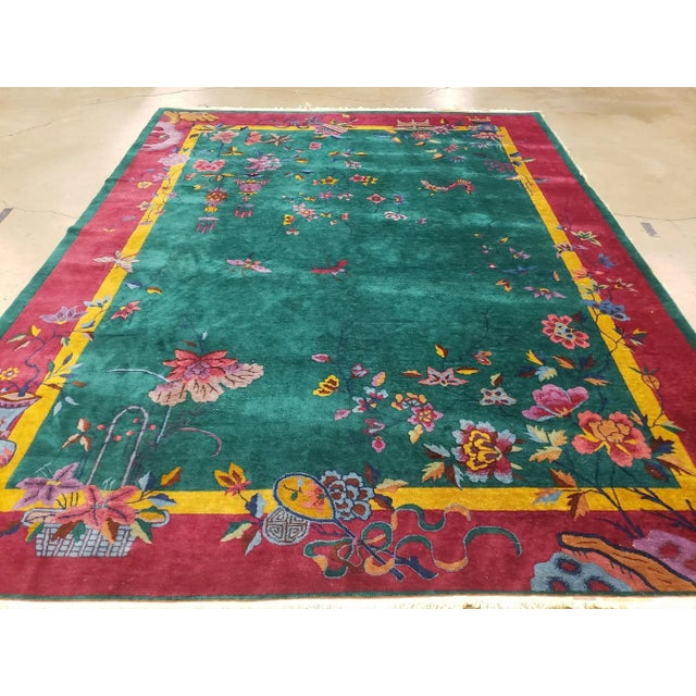 Hand knotted of top-quality wool and cotton in the 1930s. This Art Deco Chinese Oriental Rug measures 8'11" x 11'4". It...