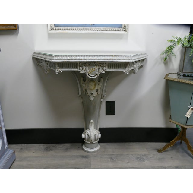 Antique Italian mirrored-top console table. Heavily carved late 19th/early 20th century Italian painted console in a gray...