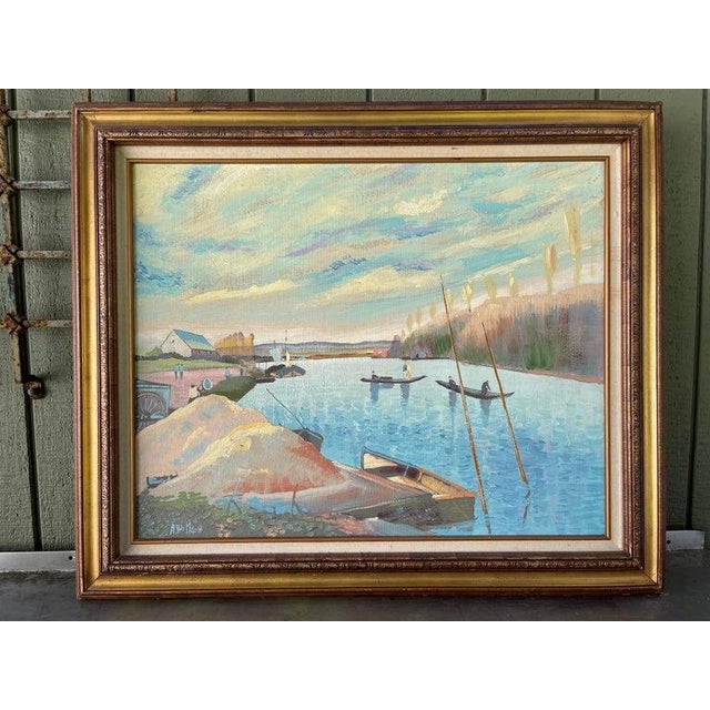 Signed Large Painting of a Waterfront Lake. Lovely oil on canvas in pastel hues in a wooden frame. Signed lower left A....