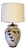 Unique and large in scale, this lamp features a textured and mottled glaze in shades of tan and brown. The leaf motif has...