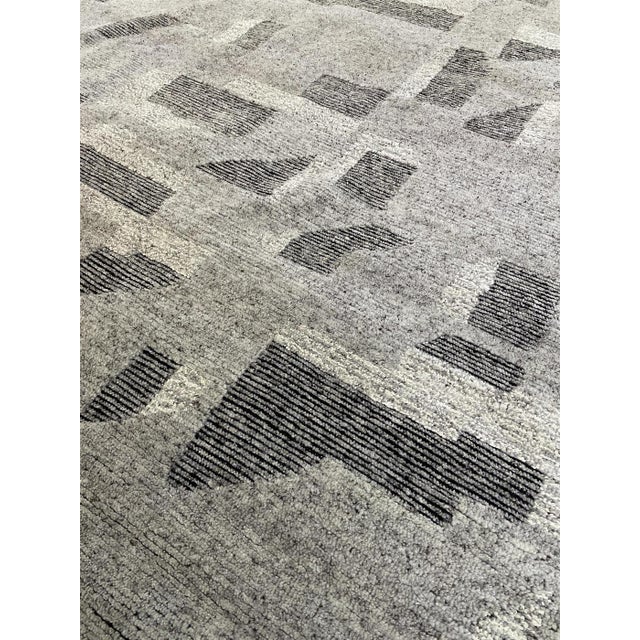 Beautiful hand knotted modern rug. Made of 75% wool and 25% silk with very modern design and colors, this extremely...