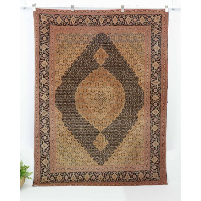 Vintage Turkish Hand-Knotted vintage rug is a semi-antique vintage Area rug.'70s Eastern region of Turkey's unique rug is...