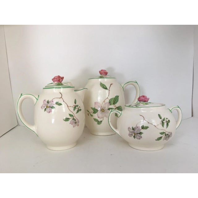 This is an adorable rare ceramic tea set made in England in the 1940s. The set includes a one cup teapot, creamer, and...