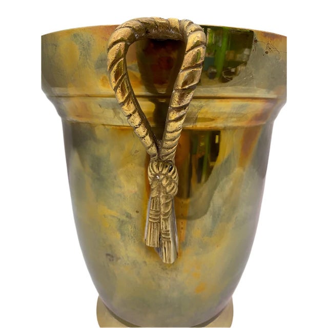Indulge in the timeless elegance of our Vintage Brass Wine Cooler and Ice Bucket with tassel styled handles. Crafted with...