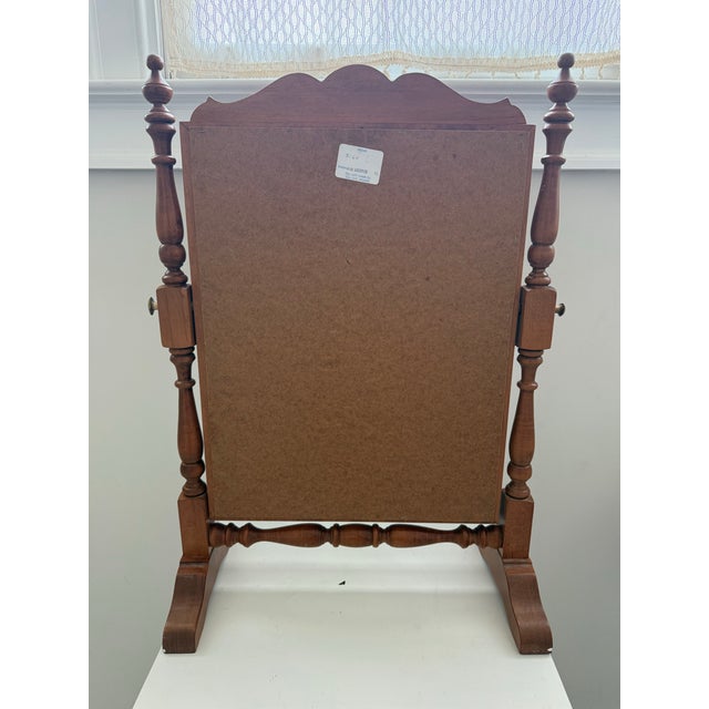Beautiful vintage Tell City Chair Co. tabletop vanity mirror, made in Tell City, Indiana. This piece features a warm wood...