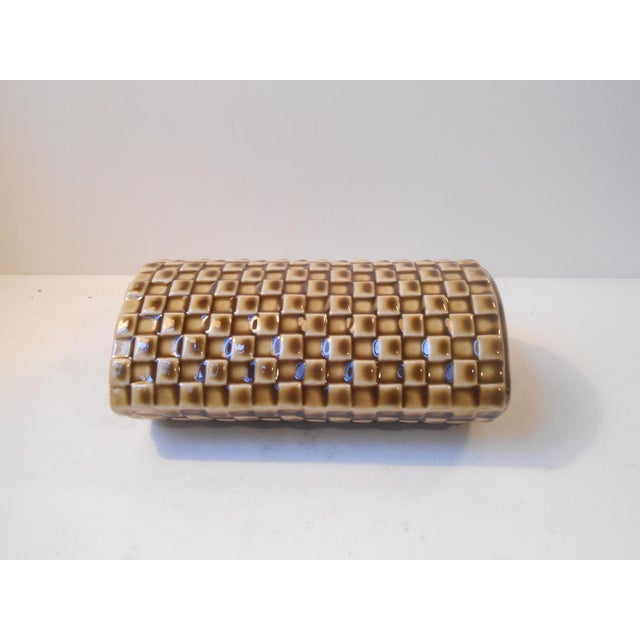 - Harlequin patterned vase with honey glaze designed by Kaarina Aho in the series ‘Harlekiin' - Manufactured by Arabia in...