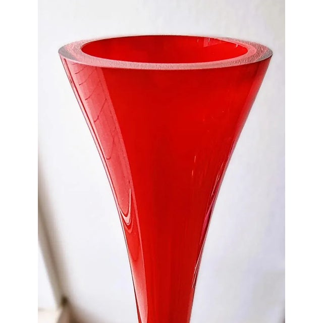 "Rod Vase Object: Glass Vase Age: Approx. 1970s Color/Material: Red / Glass Dimensions: Height: 100 cm Top: 12 cm Base: 18...