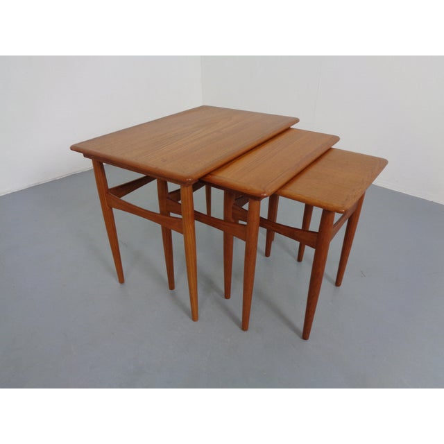 Set of 3 teak tables by Kai Kristiansen for Skovmand & Andersen from the 1960s. Height 43/45/47 cm. Width 34/46.5/59 cm....