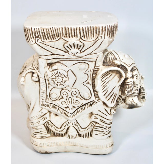 A charming vintage boho chic white elephant garden stool, circa 1960s. This is a stellar vintage piece, excellent for...